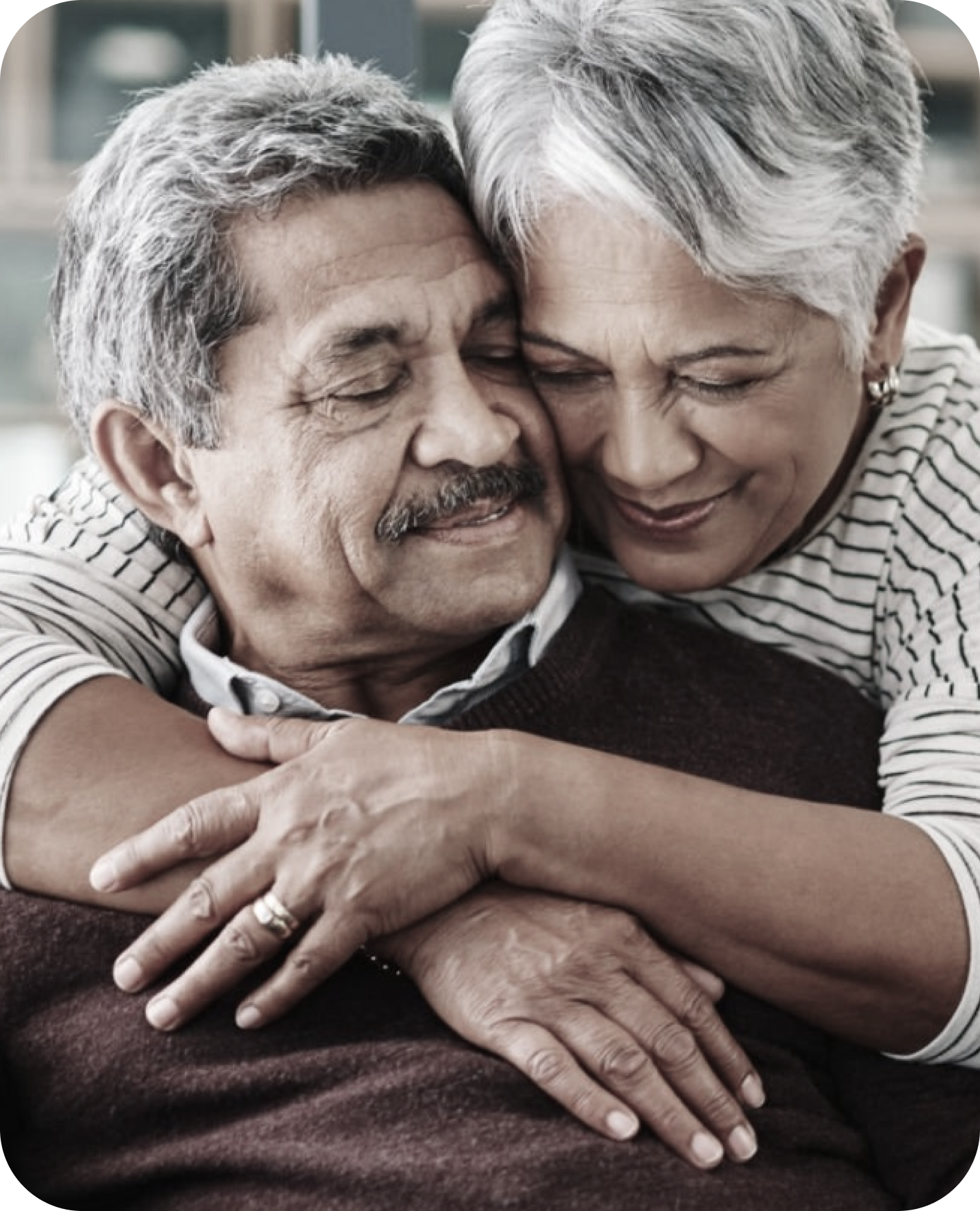 man and woman hugging